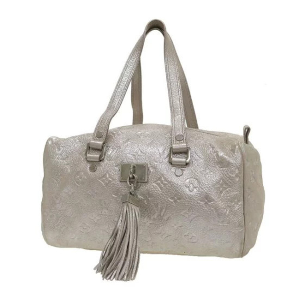Louis Vuitton Limited Edition Silver Monogram Shimmer Comete Bag